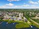 Waterfront property with a dock, showcasing its prime location in a vibrant community at 826 Christina Cir, Oldsmar, FL 34677