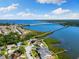 Waterfront home featuring scenic views of the bay and bridge in a coastal community at 826 Christina Cir, Oldsmar, FL 34677