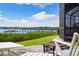 This backyard features a peaceful waterfront view at 826 Christina Cir, Oldsmar, FL 34677