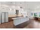 Spacious kitchen featuring a large center island, modern appliances, and custom cabinetry at 826 Christina Cir, Oldsmar, FL 34677