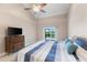 Bright main bedroom boasts vaulted ceiling and sliding glass door leading to the pool and backyard at 826 Christina Cir, Oldsmar, FL 34677