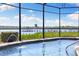 This beautiful pool offers stunning water views at 826 Christina Cir, Oldsmar, FL 34677