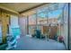 Screened-in patio with exercise equipment, providing an indoor/outdoor living space at 9031 Westchester Cir # 128, Tampa, FL 33604