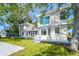 Beautiful backyard with a wooden deck perfect for outdoor entertaining and relaxation at 9265 Treasure Ln Ne, St Petersburg, FL 33702