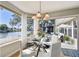 Cozy dining area with water view, perfect for intimate meals and gatherings at 9265 Treasure Ln Ne, St Petersburg, FL 33702
