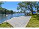 A waterfront home with a private dock extending into a canal at 9265 Treasure Ln Ne, St Petersburg, FL 33702