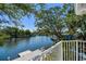 Enjoy breathtaking water views from your private balcony overlooking the serene waterfront at 9265 Treasure Ln Ne, St Petersburg, FL 33702
