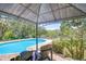 The pool area offers a gazebo with seating and views of the lake at 9303 Alice Ln, Riverview, FL 33578