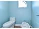 This well lit toilet room features a bidet for added comfort and convenience at 9303 Alice Ln, Riverview, FL 33578