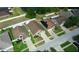 An aerial showcases well-maintained homes and a pond at 944 Ridge Haven Dr, Brandon, FL 33511