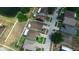 Aerial view of well maintained homes, landscaping, and a pond at 944 Ridge Haven Dr, Brandon, FL 33511