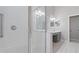 The bathroom features a glass door shower, tiled walls, and ample vanity space at 944 Ridge Haven Dr, Brandon, FL 33511