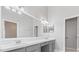 This bathroom features double sinks and expansive mirror at 944 Ridge Haven Dr, Brandon, FL 33511