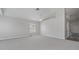 Spacious bedroom with neutral carpet, large windows, ceiling fan and view to backyard at 944 Ridge Haven Dr, Brandon, FL 33511
