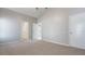 A bedroom with adjoining bathroom and closet showcases functional design and carpeted floors at 944 Ridge Haven Dr, Brandon, FL 33511