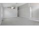 Bright, open carpeted bedroom with ceiling fan, high ceiling and access to other rooms at 944 Ridge Haven Dr, Brandon, FL 33511