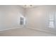 Bright and open bedroom features neutral walls, plush carpeting, and large windows at 944 Ridge Haven Dr, Brandon, FL 33511