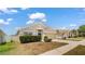 Attractive single-story home with a two-car garage, established landscaping, and a welcoming facade at 944 Ridge Haven Dr, Brandon, FL 33511