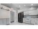 Spacious kitchen with stainless steel refrigerator and functional layout at 944 Ridge Haven Dr, Brandon, FL 33511