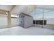 Enclosed patio with a ceiling fan and includes a shed for storage at 944 Ridge Haven Dr, Brandon, FL 33511