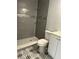 Modern bathroom with a tiled shower and updated fixtures, offering a stylish space at 1010 Lochmont Dr, Brandon, FL 33511