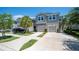 Charming two-story townhome with manicured landscaping and attached two-car garage at 10127 Newel Valley Loop, Riverview, FL 33569