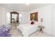 Cozy bedroom with bay windows and decorative touches, perfect for relaxing at 10502 Villa View Cir, Tampa, FL 33647