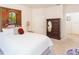 Bright bedroom featuring a white comforter, ample space, and stylish decor, providing a cozy and inviting atmosphere at 10502 Villa View Cir, Tampa, FL 33647