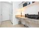 Functional office space with built-in desk, storage, and natural light, creating a productive and comfortable work environment at 10502 Villa View Cir, Tampa, FL 33647