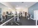 The community gym features modern workout equipment and a mirrored wall at 10502 Villa View Cir, Tampa, FL 33647
