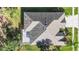Aerial rooftop view revealing the architecture, design and neutral coloring of the home at 10517 Palm Cove Ave, Tampa, FL 33647