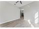 A bedroom boasts neutral colors, hard surface floors and natural light at 10517 Palm Cove Ave, Tampa, FL 33647
