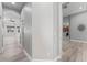 Hallway view showcasing the layout and flow, connecting the living spaces with bedrooms and kitchen at 10517 Palm Cove Ave, Tampa, FL 33647