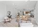 Inviting living room in an open-concept layout, blending comfort and style at 10517 Palm Cove Ave, Tampa, FL 33647