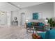 Cozy living room showcases an open floor plan with bright, neutral paint and decor at 10517 Palm Cove Ave, Tampa, FL 33647