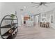 Spacious open living space with dining area and kitchen, enhanced by natural light at 10517 Palm Cove Ave, Tampa, FL 33647