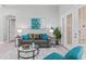Comfortable living room offers plush seating, stylish decor, and ample natural light at 10517 Palm Cove Ave, Tampa, FL 33647