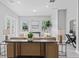 Bright and airy living room with comfortable seating and view to the outside at 10517 Palm Cove Ave, Tampa, FL 33647