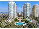Luxury high-rise condos featuring multiple pools, lush landscaping, and beautiful views of the bay at 1170 Gulf Blvd # 2101, Clearwater Beach, FL 33767