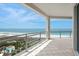 Expansive balcony boasting panoramic views of the sandy beach and sparkling ocean at 1170 Gulf Blvd # 2101, Clearwater Beach, FL 33767