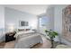 Stylishly designed bedroom with a serene ambiance, water view, and modern decor at 1170 Gulf Blvd # 2101, Clearwater Beach, FL 33767
