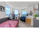 Bright bedroom with water views from large windows and a private balcony at 1170 Gulf Blvd # 2101, Clearwater Beach, FL 33767