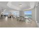 Spacious living and dining area with floor-to-ceiling windows and breathtaking ocean views at 1170 Gulf Blvd # 2101, Clearwater Beach, FL 33767