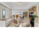 Bright and open living space with modern furniture, elegant decor, and expansive ocean views at 1170 Gulf Blvd # 2101, Clearwater Beach, FL 33767