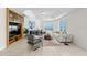 Bright living room with large windows showcasing ocean views, modern furniture, and stylish decor at 1170 Gulf Blvd # 2101, Clearwater Beach, FL 33767