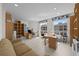 Open-concept space featuring tiled floors, multiple workspaces, and an abundance of natural light at 1170 Gulf Blvd # 2101, Clearwater Beach, FL 33767