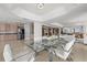 Open-concept living space with modern dining table set and ocean views at 1170 Gulf Blvd # 2101, Clearwater Beach, FL 33767