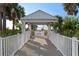 Charming walkway and gazebo with views of the ocean, perfect for a leisurely stroll at 1170 Gulf Blvd # 2101, Clearwater Beach, FL 33767