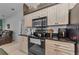 Charming kitchen with granite counters, stainless appliances, and access to the living room at 12923 Colony Rd, Hudson, FL 34669