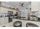 This kitchen features granite countertops, stainless steel appliances, and ample cabinet space at 12923 Colony Rd, Hudson, FL 34669